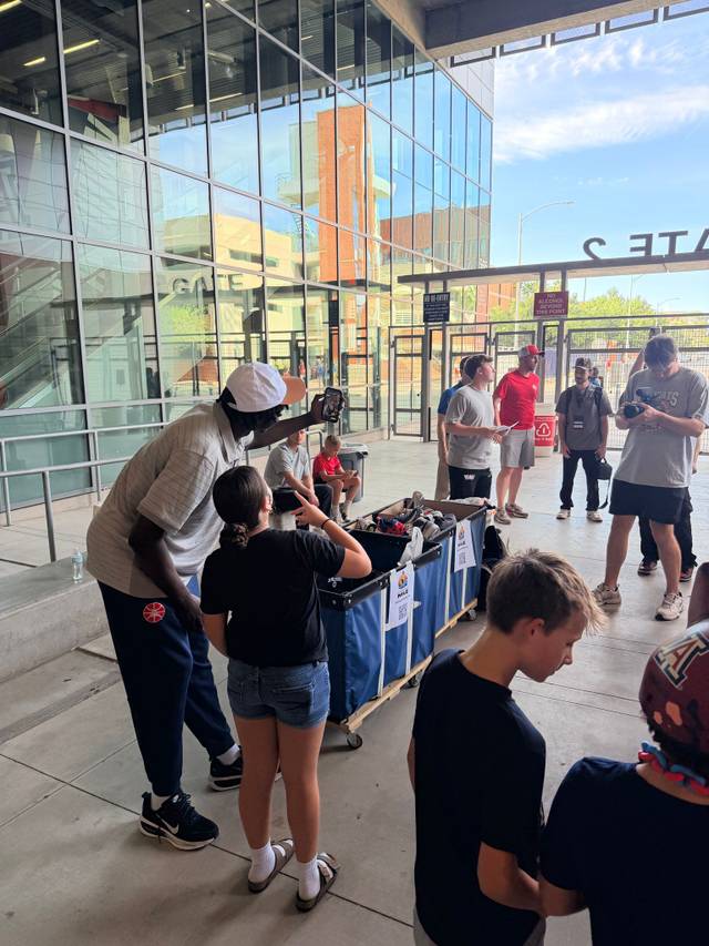 Children of the Nile Hosts a Successful Shoe Drive at the Arizona Football Spring Showcase — photo 2